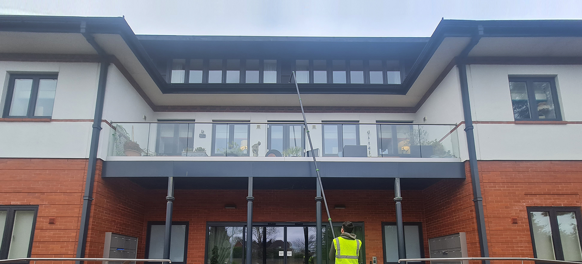 react gutter clearance man clearing gutters